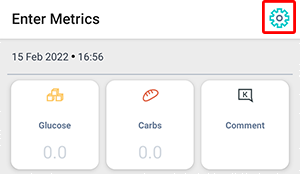 The 'Enter metrics' screen. The settings icon is highlighted in the upper right corner.